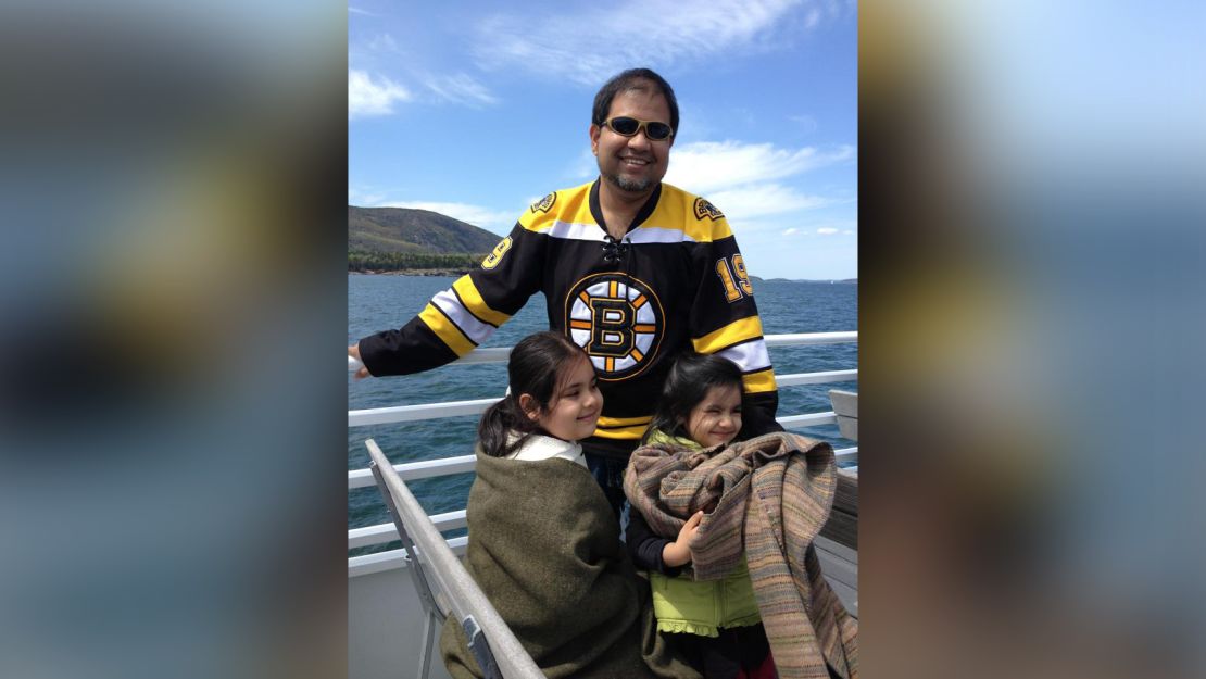 Nakibur Rahman and his two daughters.