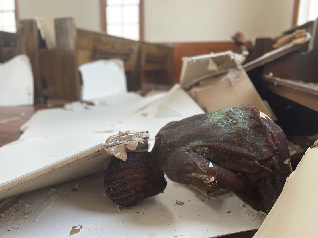 The church is filled with small statues called the "Children of Whitney." One of the statues fell off the pew during the storm, but it's believed to be restorable.