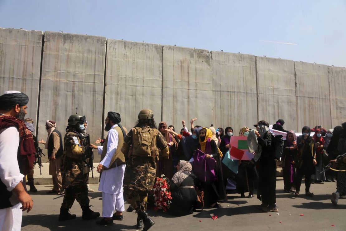 Taliban guards intervene against women holding a demonstration in Kabul on September 4, 2021.