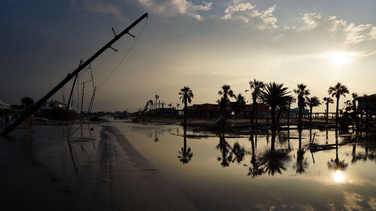 A road is partially covered in floodwater in the wake of Hurricane Ida on September 3, 2021 in Grand Isle, Louisiana.