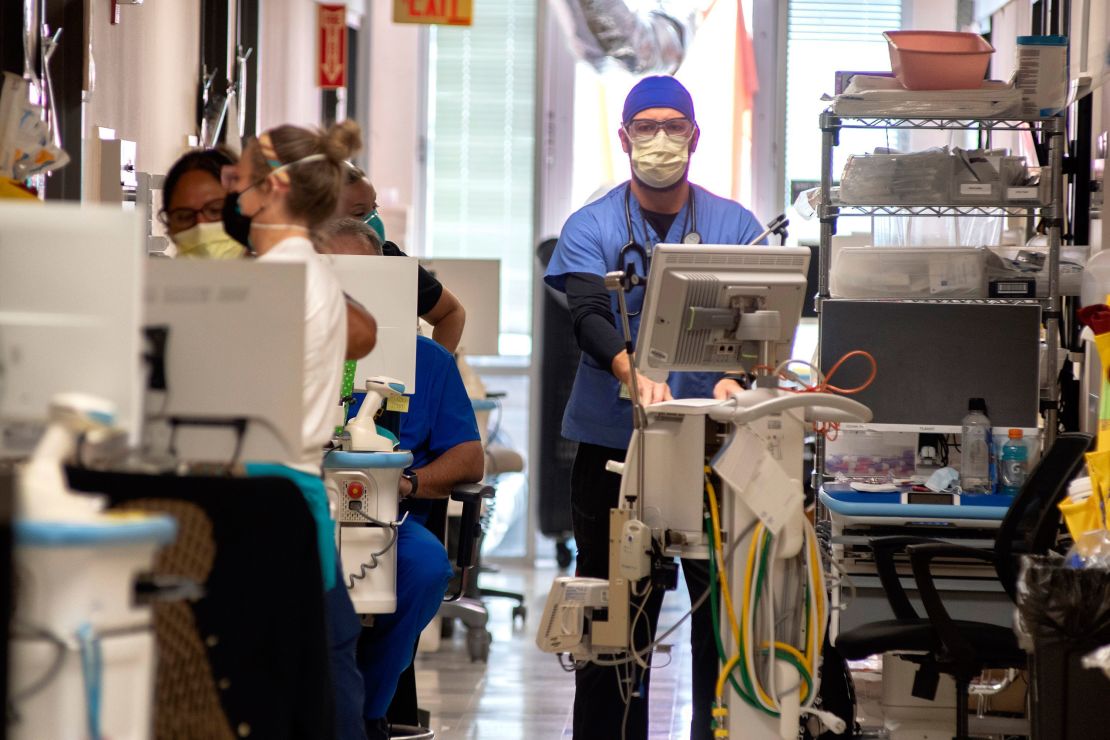 Northeast Georgia Medical Center critical care staff work with Covid-19 patients on Monday, August 30, 2021, in Gainesville, Georgia. Many hospitals are experiencing a surge in Covid-19 patients as the state set a new mark for infections.