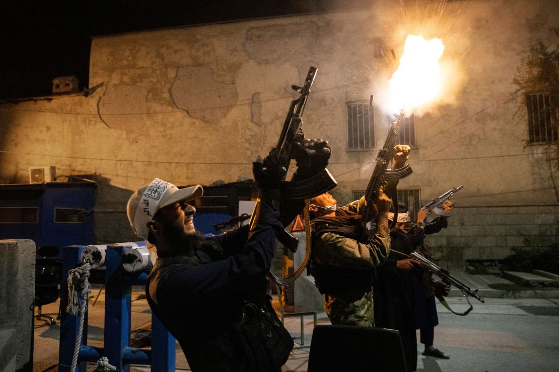 Taliban fighters in Kabul fire their guns in celebration after receiving unconfirmed reports that Panjshir Province had fallen to their forces on Friday.