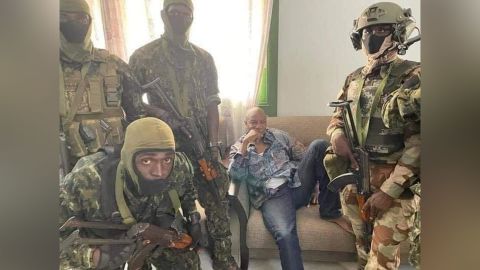 A social media image appears to show President Alpha Conde surrounded by soldiers.