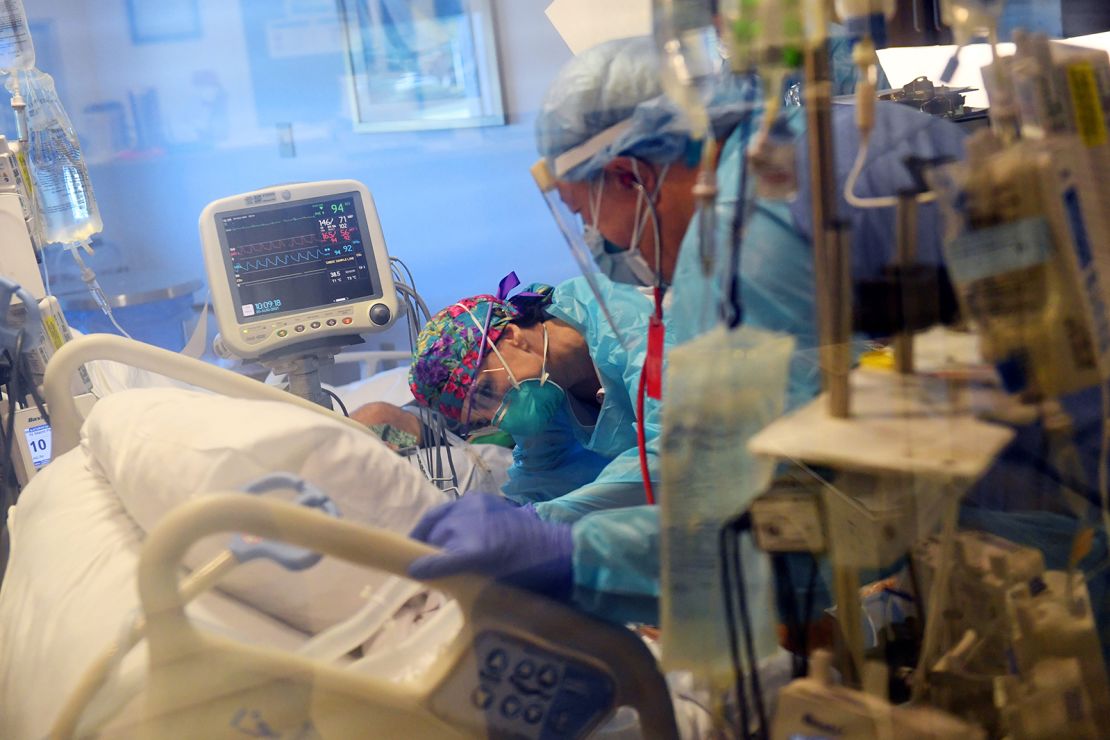 Medical staff attend to a Covid-19 patient in the Surgical Intensive Care Unit at Cleveland Clinic Indian River Hospital in Vero Beach, Florida, on August 20.