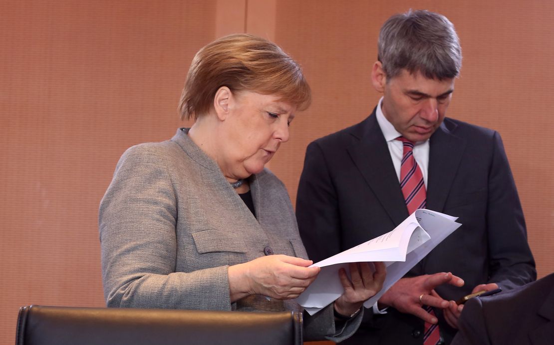 German Federal Chancellor Angela Merkel and her then foreign policy advisor Jan Hecker on January 15, 2020 in Berlin, Germany.