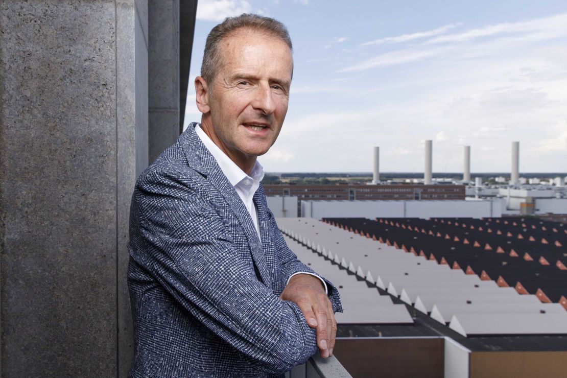 Volkswagen Group CEO Herbert Diess poses above the company grounds during a photo shoot. 