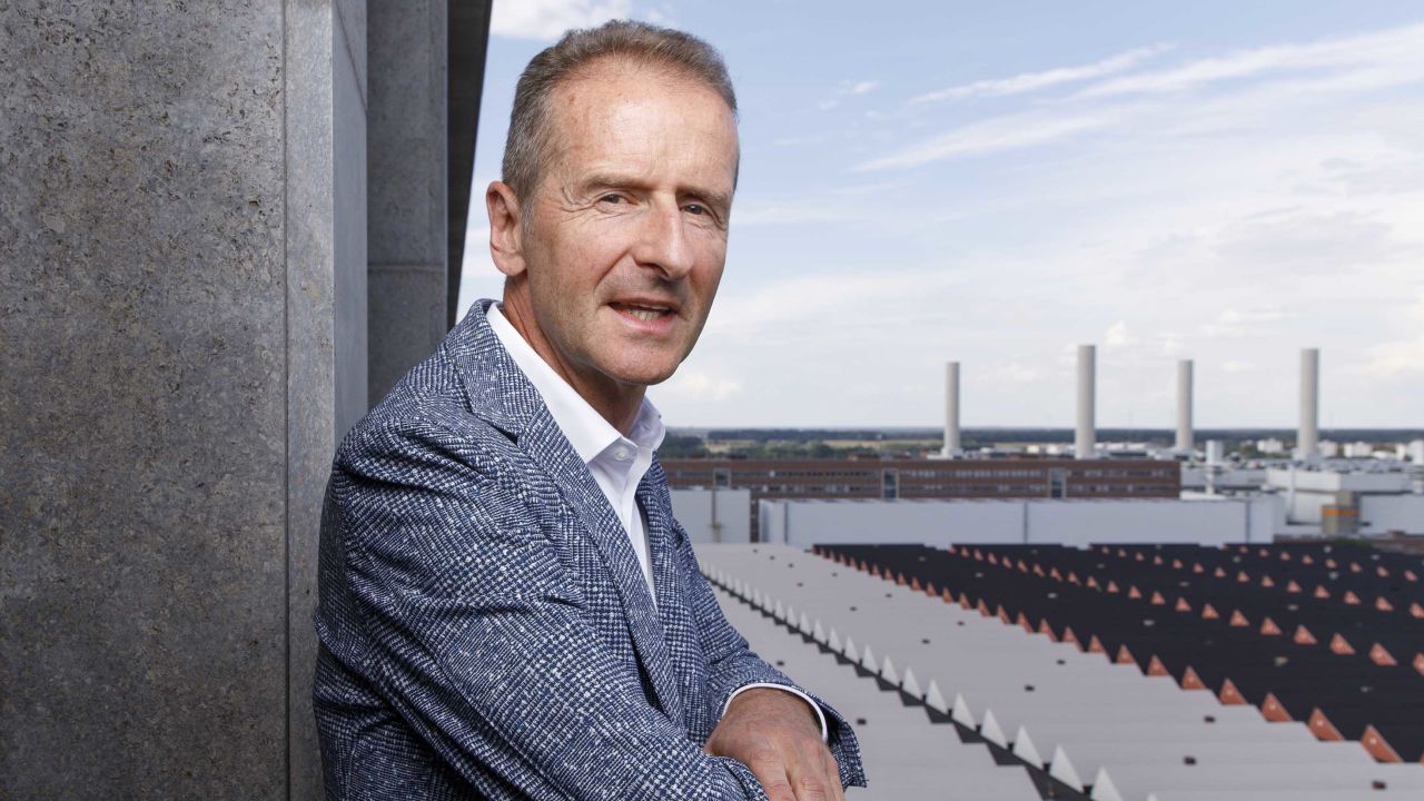 Volkswagen Group CEO Herbert Diess poses above the company grounds during a photo shoot.