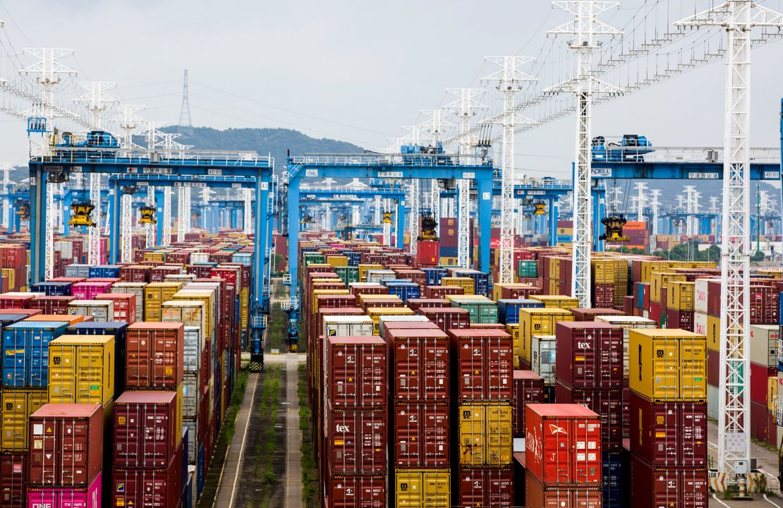 Containers are seen transported at Ningbo-Zhoushan port on August 15, 2021 in China. 