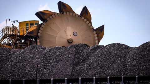 A bucket-wheel reclaimer by a pile of coal at the Port of Newcastle in Australia on October 12, 2020.