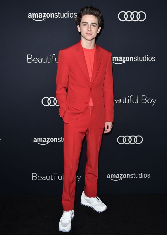 Chalamet pictured at the 2018 Los Angeles premiere of "Beautiful Boy" in a red Louis Vuitton suit.