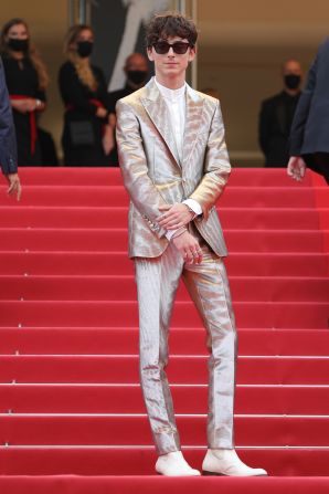 Following a long red carpet hiatus, Chalamet returned in full force with a shiny Tom Ford suit to a 2021 Cannes screening of "The French Dispatch."