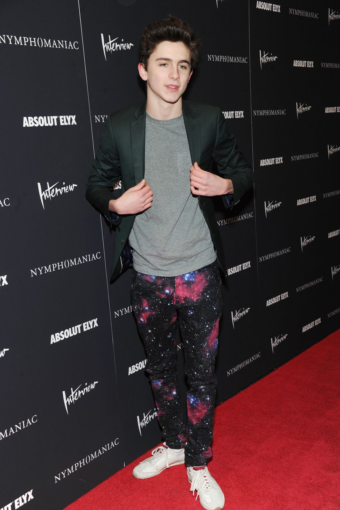 Timothee Chalamet in 2014 wearing galaxy-print trousers to a screening of "Nymphomaniac."