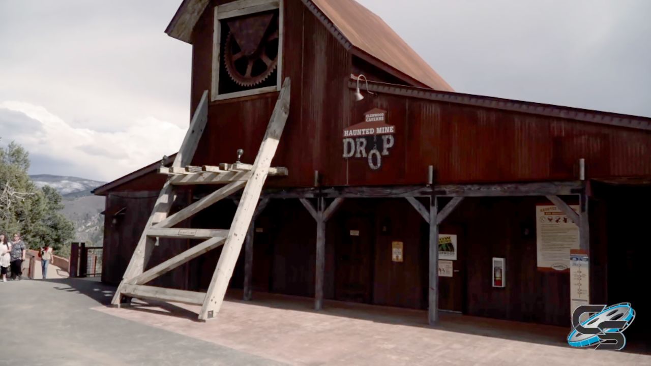 A view of the outside of the Haunted Mine Drop attraction from 2019.