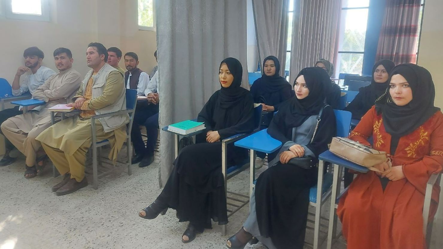 Students attend class at Avicenna University in Kabul, Afghanistan, on September 6, 2021, in this picture obtained by Reuters from social media. 