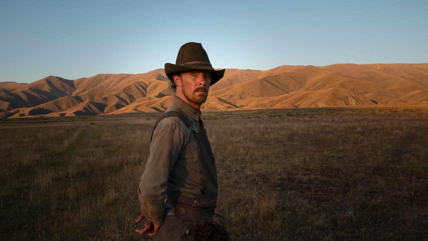 Benedict Cumberbatch as rancher Phil Burbank is shown in a scene from "The Power of the Dog." 