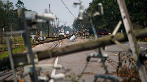 Downed utility poles lie on a road in Albany, Louisiana, on September 2.