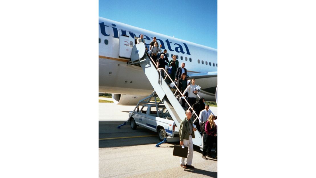Nick took this photo of the passengers finally disembarking Continental 5 in Gander, Canada.