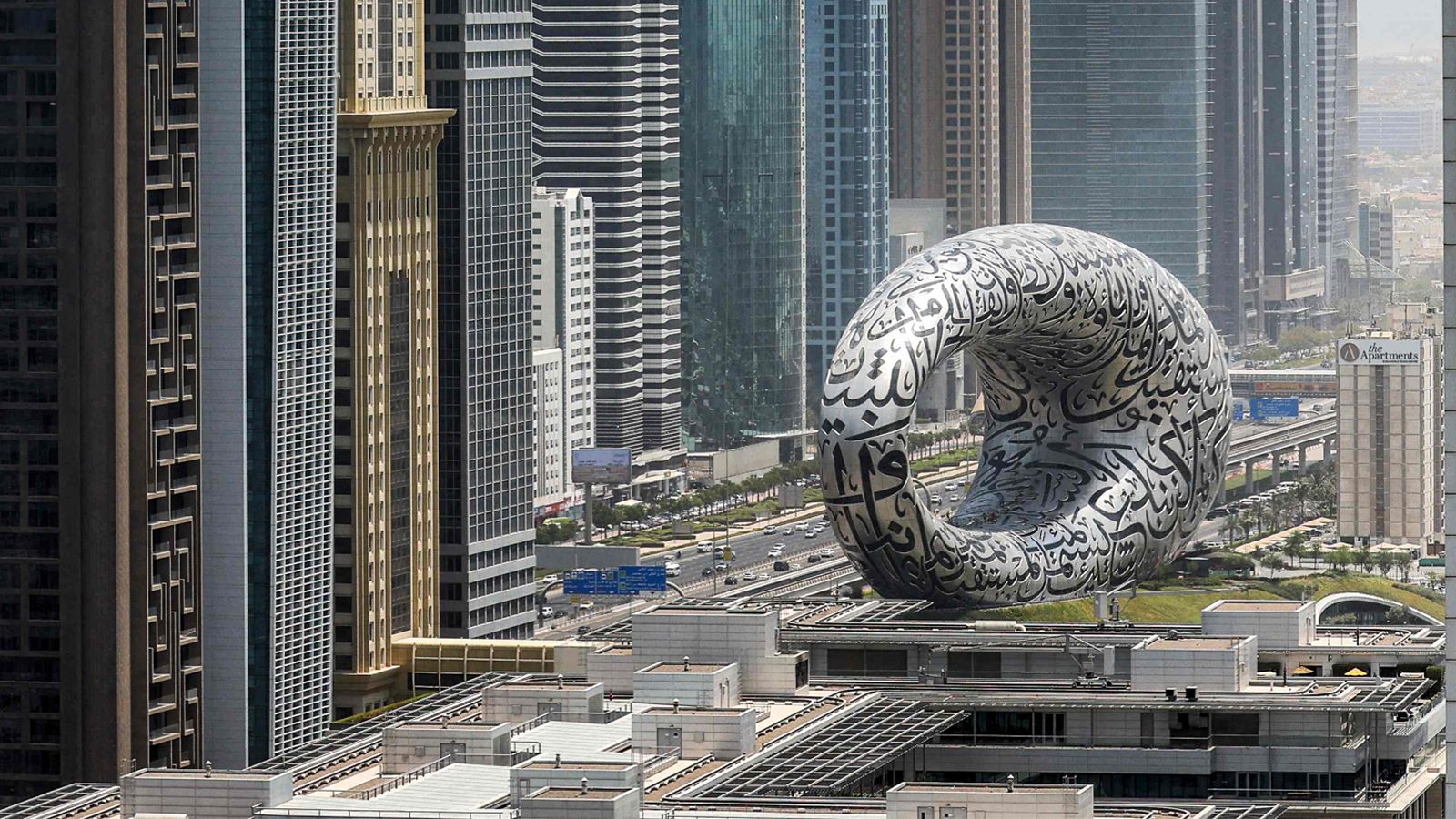 <strong>Marvel at the Museum of the Future -- </strong>The intricately decorated Museum of the Future opened in 2022. Its squashed donut shape is constructed of nearly <a href="index.php?page=&url=https%3A%2F%2Fwww.museum-of-future-tickets.com%2F" target="_blank" target="_blank">2,400 fiberglass and stainless steel panels</a>, adorned with Arabic calligraphy. 