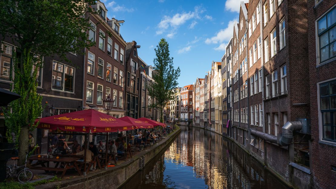 A view of an Amsterdam canal on August 19. The Netherlands got moved on Tuesday to the CDC's Level 3, an improvement over its previous Level 4 placement.