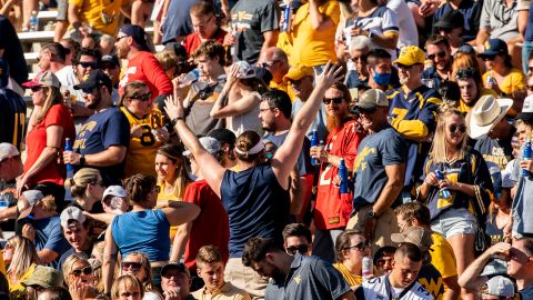Fans at a college football game between the Maryland Terrapins and the West Virginia Mountaineers on September 04, 2021.