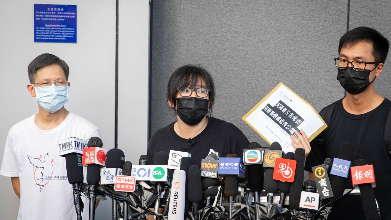 Chow Hang-tung and two other committee members of the Hong Kong Alliance at a press conference in Hong Kong on September 7.