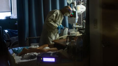 Doctor Delkhah Shahin checks on a 34 year old, unvaccinated Covid-19 patient at Providence Cedars-Sinai Tarzana Medical Center in Tarzana, California.