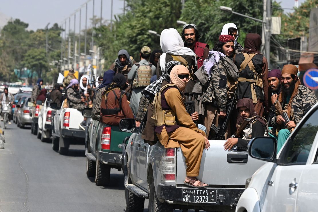 A convoy of Taliban fighters patrol along a street in Kabul on September 2, 2021.