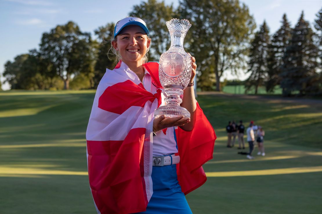 Pedersen poses with the trophy at the 2021 Solheim Cup.