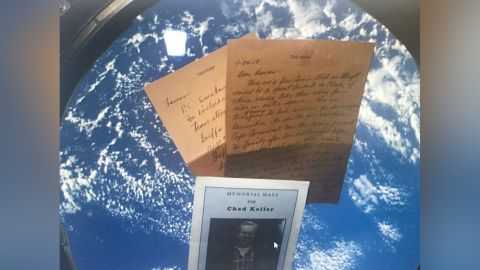 Personal items from the Keller family that went to space include one of Chad's letters as well as his memorial program.
