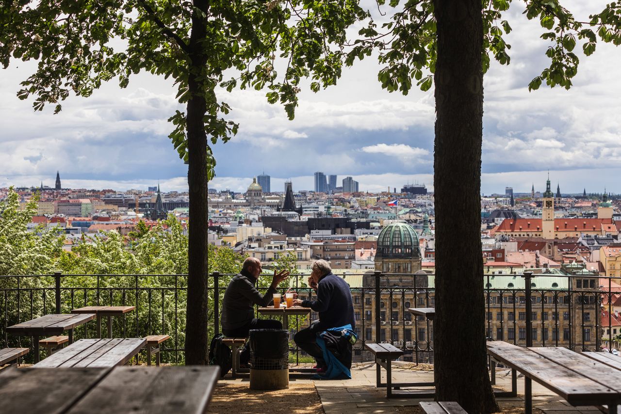 <strong>7. Prague, Czech Republic</strong>: The eastern European city of Prague was also crowned the most beautiful in the world, says Time Out. Pictured here: people drinking on a terrace in the city in May 2021.