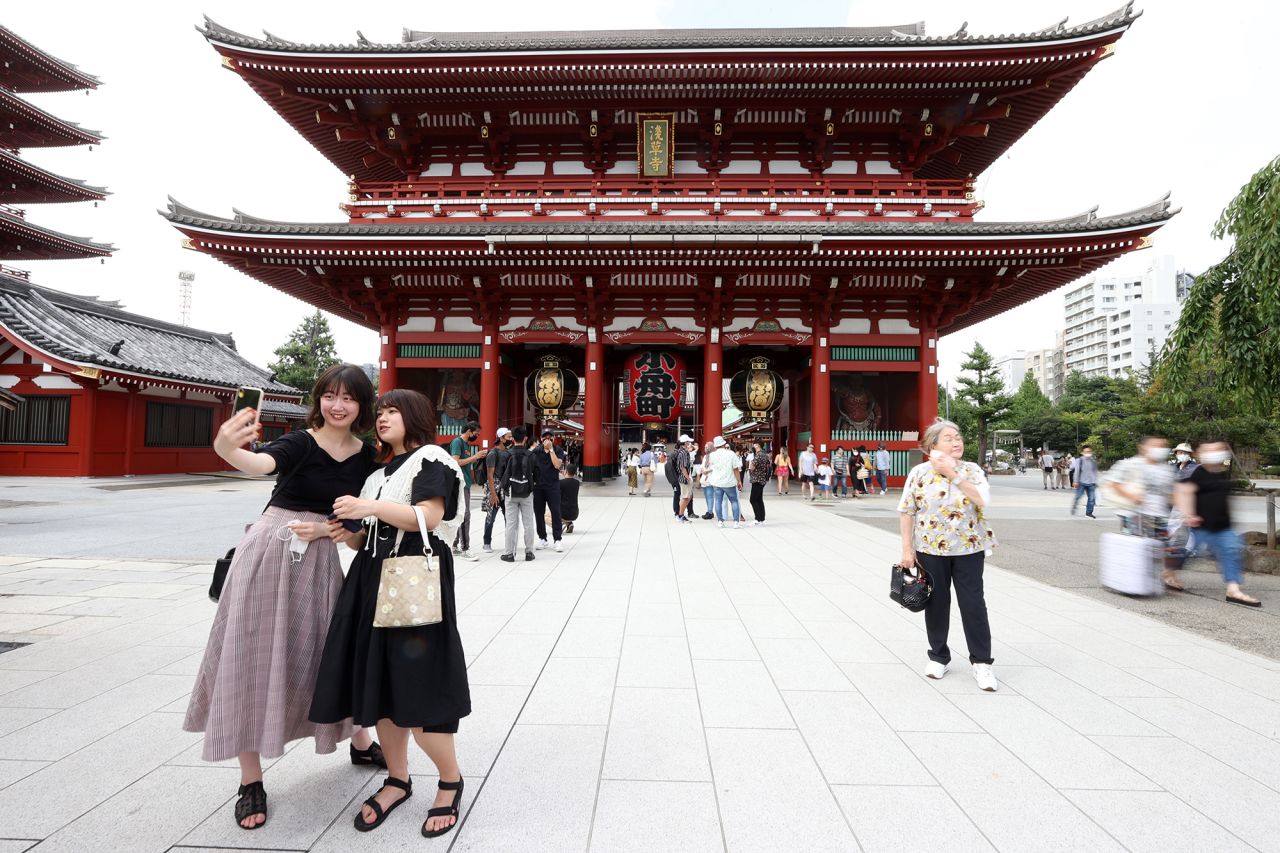 <strong>The world's best cities: </strong>Time Out surveyed city residents from across the world to put together its 2021 round-up of the world's best urban hubs. <strong>Tokyo, Jap</strong><strong>an</strong><strong> came in at number 10</strong>. Pictured here: people visiting Senso-ji Temple in Tokyo, Japan in August 2021. 