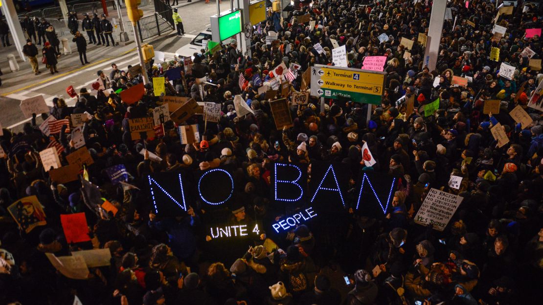 Protesters rally during a demonstration against the travel ban targeting predominantly Muslim countries, January 2017, New York City.