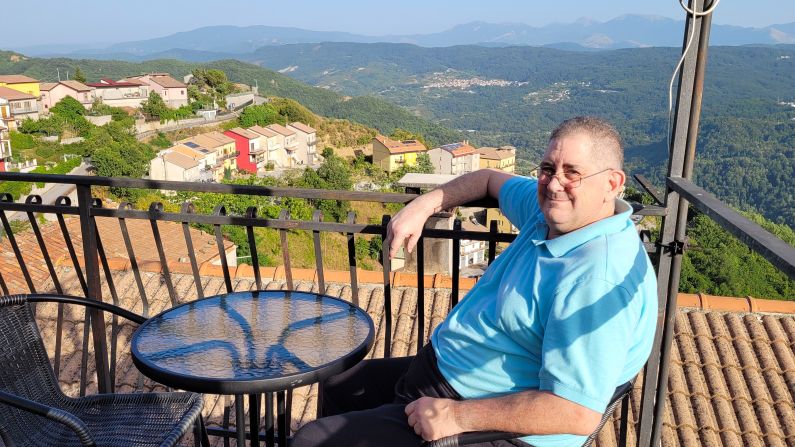 <strong>Idyllic location: </strong>Frank Cohen enjoys his balcony view from the freshly-painted dwelling, which dates back to the 1940s.