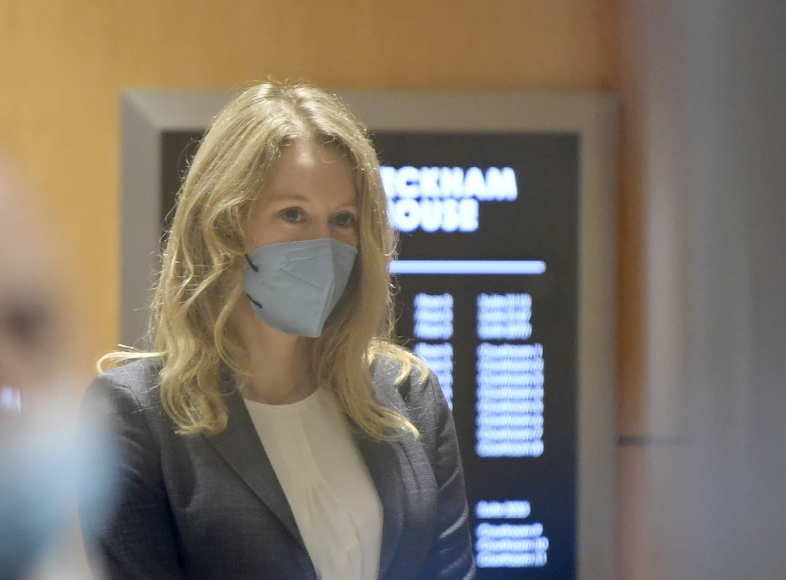 Elizabeth Holmes walks into the federal courthouse for her trial in San Jose, Calif., Wednesday, Sept. 8, 2021.  Holmes is accused of duping elite financial backers, customers and patients into believing that her startup was about to revolutionize medicine. If convicted by a jury in San Jose, California, she could be sentenced to 20 years in prison.