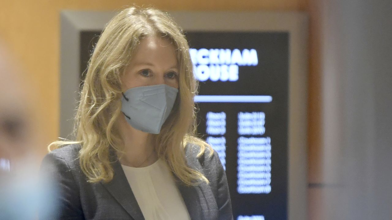Elizabeth Holmes walks into the federal courthouse for her trial in San Jose, Calif., Wednesday, Sept. 8, 2021. Holmes is accused of duping elite financial backers, customers and patients into believing that her startup was about to revolutionize medicine. If convicted by a jury in San Jose, California, she could be sentenced to 20 years in prison.
