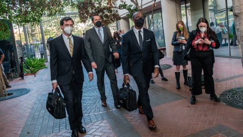 Lawyers in the fraud trial of Elizabeth Holmes, the founder and former CEO of blood testing and life sciences company Theranos, arrive for the first day of the trial, outside Federal Court in San Jose, California. 