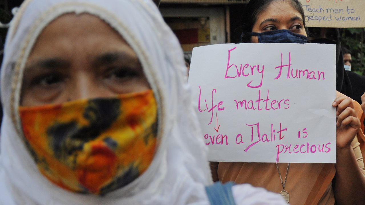 A woman in Mumbai protests in June 2020 against caste-based sexual violence happening in different parts of the country.