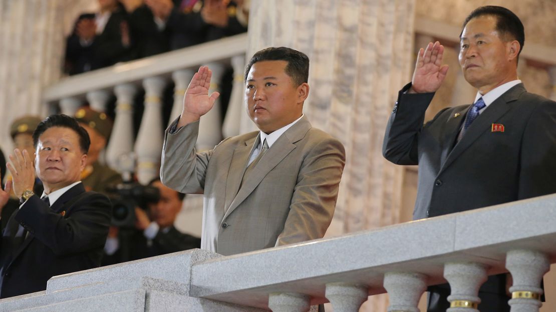 North Korea leader Kim Jong Un (center) attends a parade held to mark the 73rd anniversary of the republic in Pyongyang. This undated image was supplied by North Korea's Korean Central News Agency on September 9.