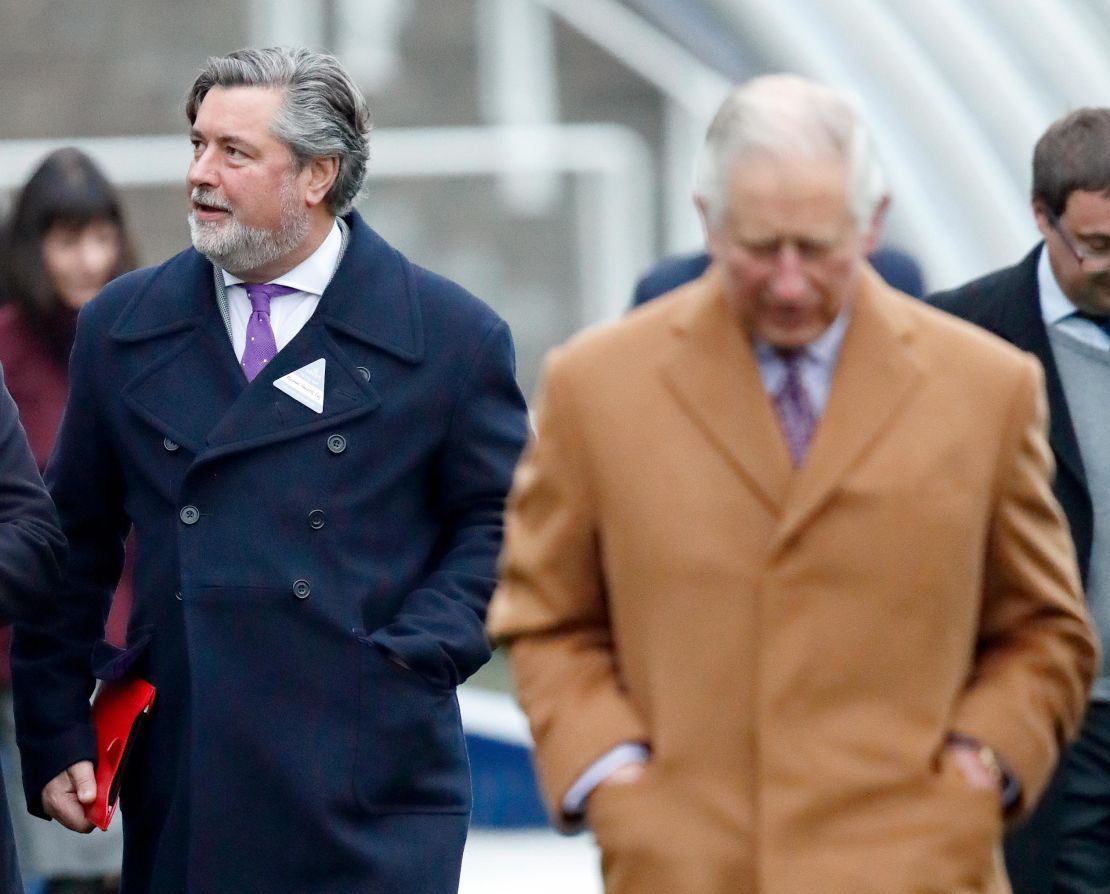 Michael Fawcett, former valet to Prince Charles and current chief executive of the Prince's Foundation (L), accompanies Prince Charles at Ascot Racecourse in England on November 23, 2018.