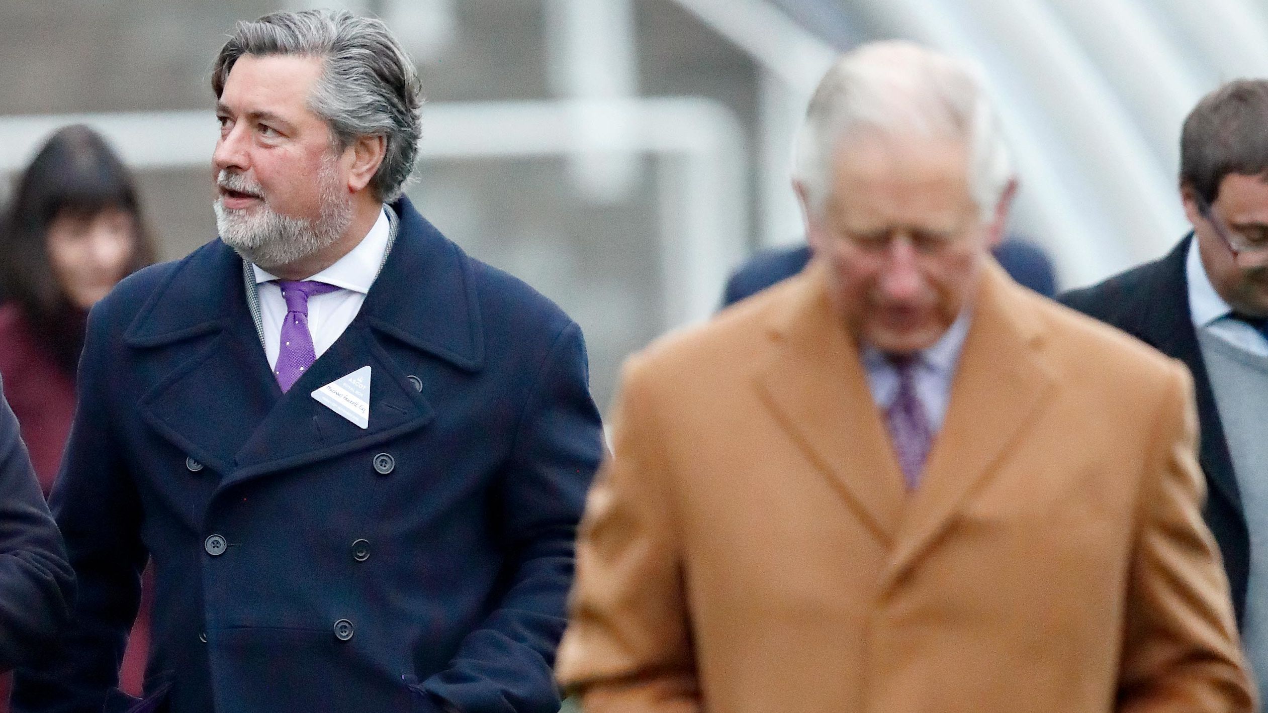 Michael Fawcett, former valet to Prince Charles and current chief executive of the Prince's Foundation (L), accompanies Prince Charles at Ascot Racecourse in England on November 23, 2018.