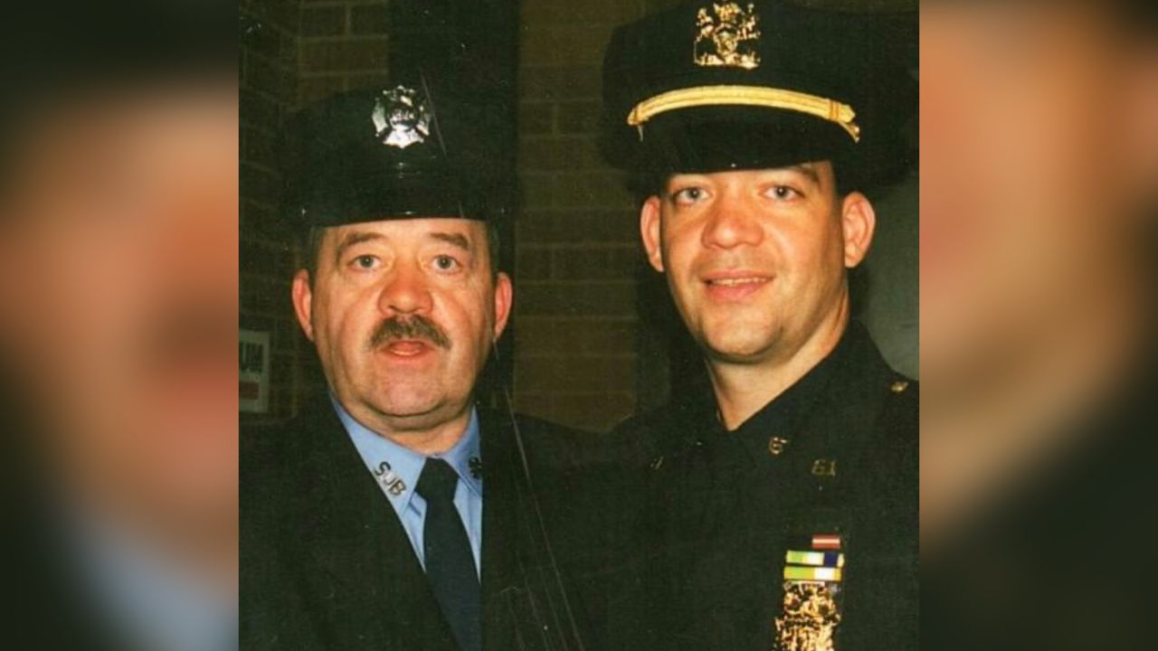 (From left) The late Robert J. Crawford and his son Mark Crawford, who is now a retired police officer, attend a ceremony for first responders, circa 2000.