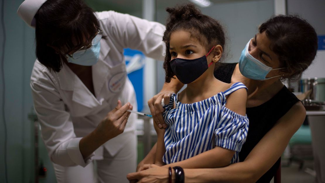 A girl gets a dose of the Cuban-made Soberana-02 vaccine in Havana on August 24, 2021.