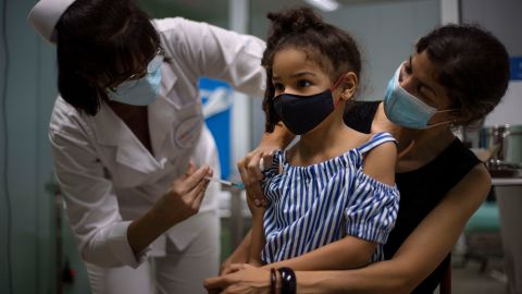 A girl gets a dose of the Cuban-made Soberana-02 vaccine in Havana on August 24, 2021. 