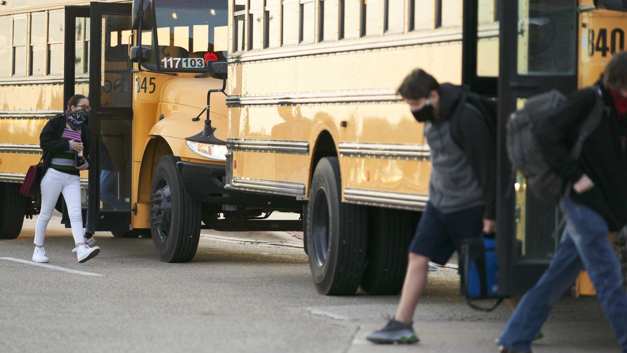 Students arrive for school at Connally Junior High School in Elm Mott, Texas, on September 7, 2021. 