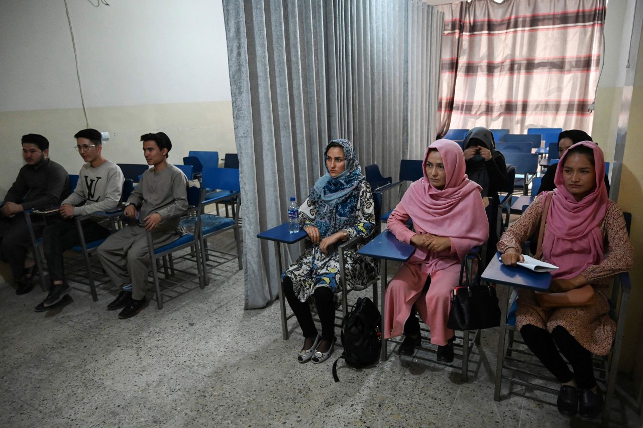 <a href="https://www.cnn.com/2021/09/07/asia/afghan-university-male-female-segregation-curtain-intl/index.html" target="_blank">A curtain separates male and female students</a> at a private university in Kabul, Afghanistan, on Tuesday, September 7. The Taliban-run Ministry of Education has approved a proposal — submitted by Afghanistan's union of universities, which represents 131 colleges — on the separation of male and female students. According to the proposal, female and male students must enter their place of learning through separate entrances. Mixed classes are only allowed where the number of female students is fewer than 15, and the classroom must be divided by a curtain.