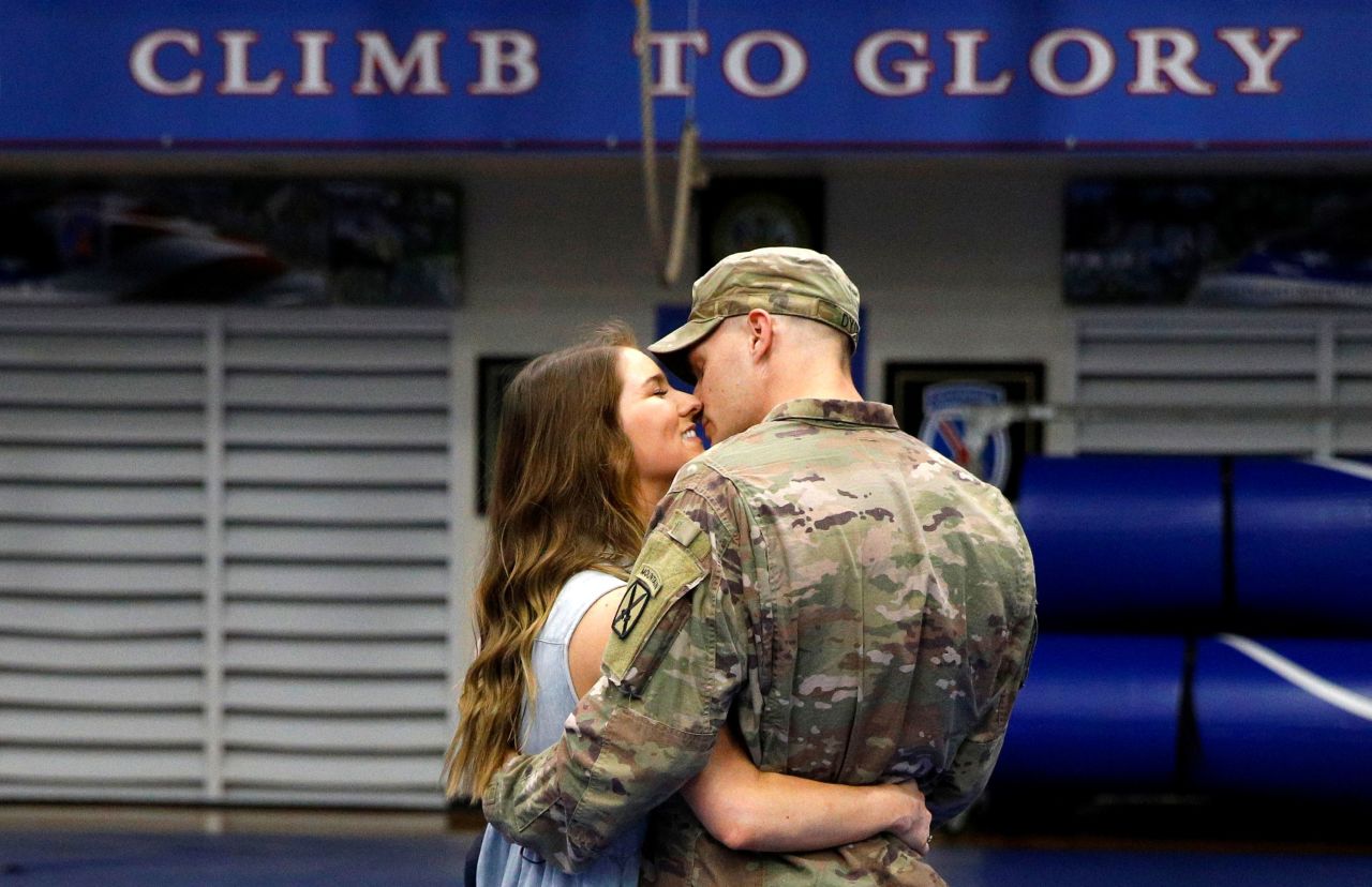 US Army Cpl. Preston Dyce is greeted by his wife, Michaela, at New York's Fort Drum after returning home from Afghanistan on Monday, September 6.