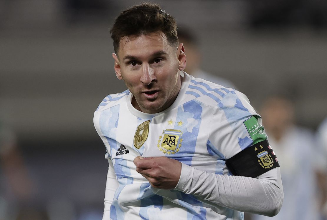 Messi celebrates scoring against Bolivia.