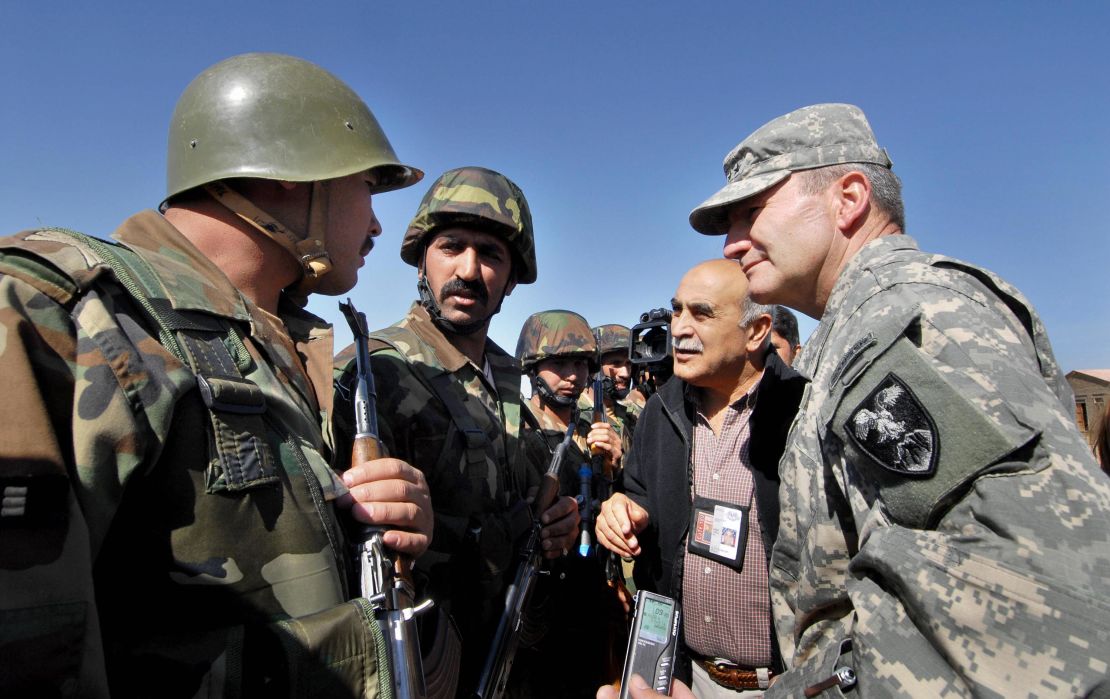 Lt. Gen. Karl Eikenberry, a commander in Afghanistan from 2005 to 2007, speaks with Afghan National Army soldiers at their remote firebase near the Pakistani border in the Barmal district of southeastern Paktika province, in October 2006.  