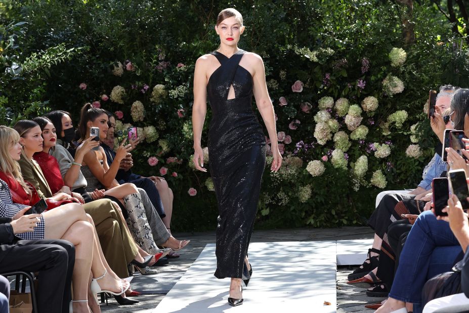 Gigi Hadid made numerous appearances at New York Fashion Week, including at Michael Kors' Spring-Summer 2022 showcase where she walked in a black sequined dress.