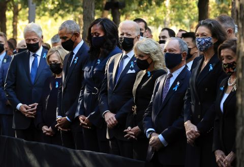 From left, Bill and Hillary Clinton, Barack and Michelle Obama, President Joe Biden and first lady Jill Biden, former New York Mayor Michael Bloomberg and his partner Diana Taylor, and House Speaker Nancy Pelosi participate in a moment of silence at the National September 11 Memorial and Museum in New York on Saturday, September 11.